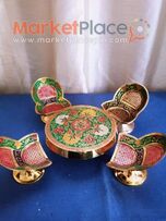 Μικρό μπρούτζινο σετ από τραπεζάκι και 4 καρέκλες.