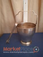 Μπρούτζινη παγωνιερα επάργυρη.