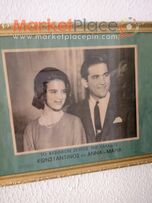 Παλαιά κορνίζα με τό βασιλικό ζεύγος της Ελλάδας αριθμημένο.