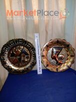 Δύο δίσκους διακοσμητικούς μπρουτζινους αιγυπτιακούς.