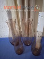 8 βάζα σέ ροζ χρώμα.