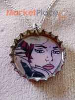 Συλλεκτικό καπάκι τής κόκα κόλα με καδένα.