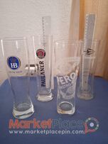 4 διάφορα μεγάλα ποτήρια μπύρας.